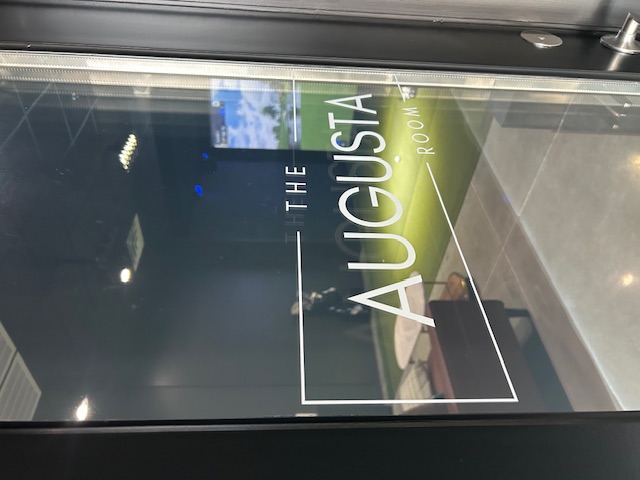 The Augusta Room entrance at Swing 365 Richmond — private indoor golf simulator suite near Richmond, TX